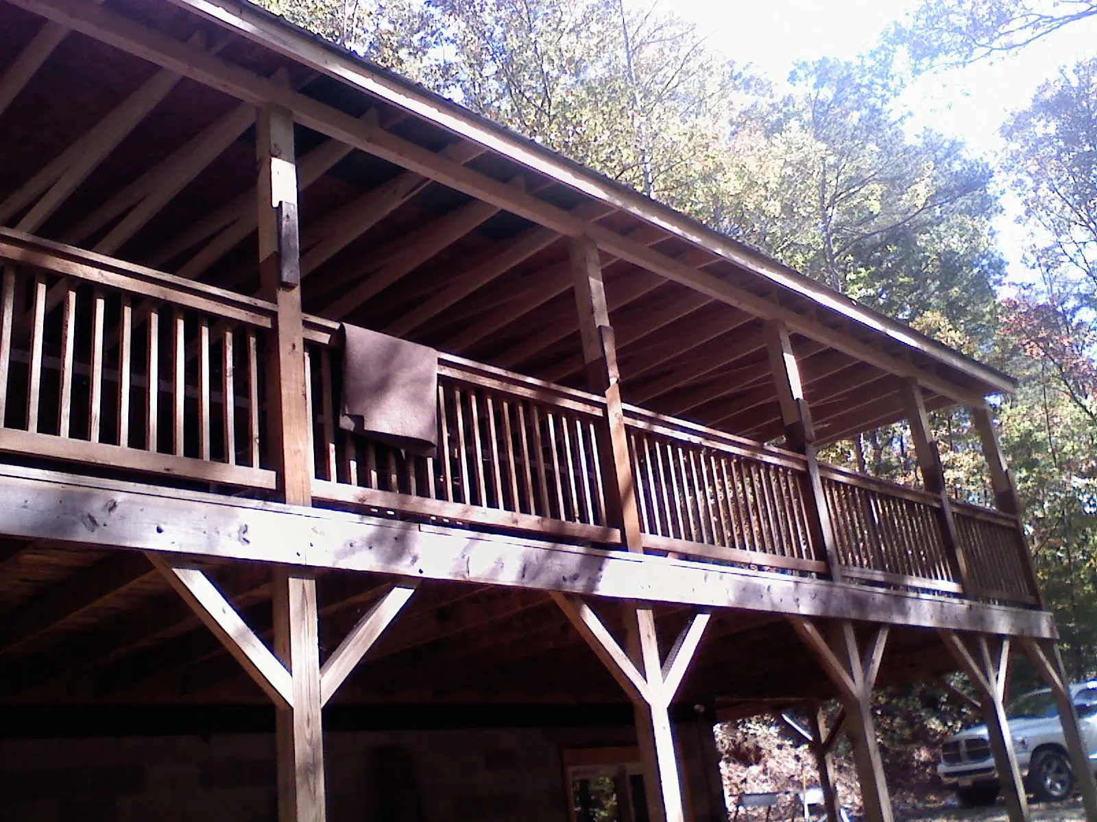 Timber framing under a new elevated porch and deck — Roof Leak Repair in Little Compton by Roofing Brothers